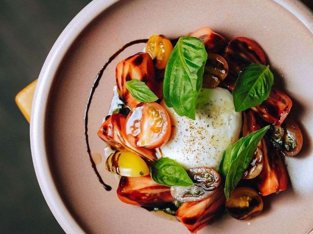 community love feature plate: burrata caprese salad