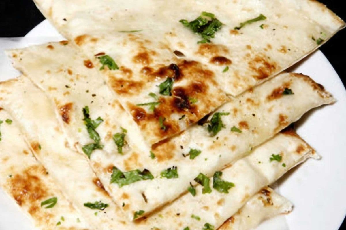 106. Tandoori Flame Stuffed Naan