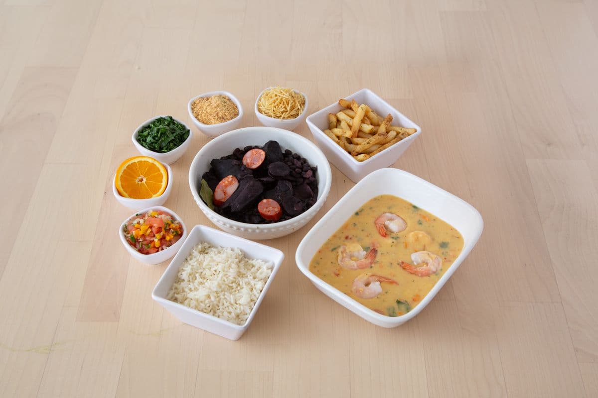 One Cassava Puree with Shrimp ( Brazilian Bobo De Camarao), One Feijoada, and Two Drinks