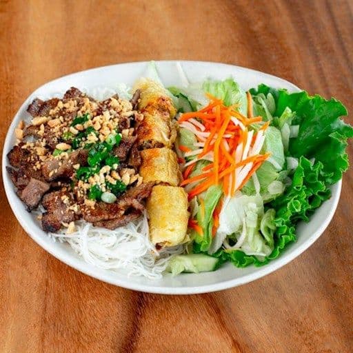 57. Grilled Meat and Spring Rolls on Vermicelli