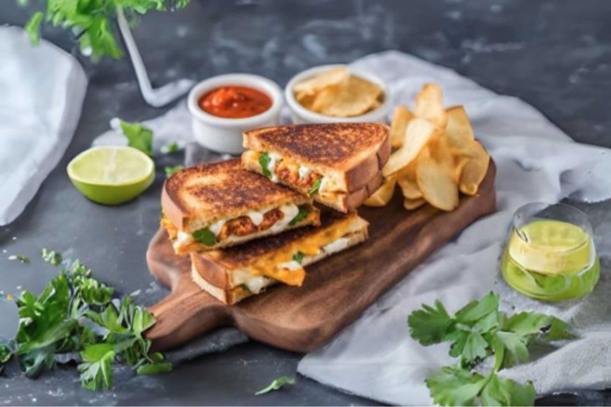 Tandoori Paneer Grilled Cheese Club Sandwich (served with potato chips)