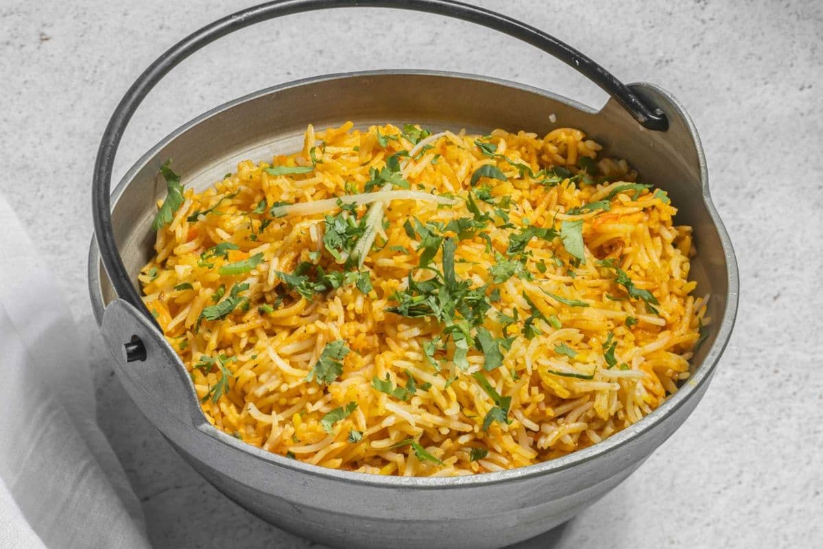 90.Flame biryani is served with a choice of lamb/ goat/ prawn / chicken