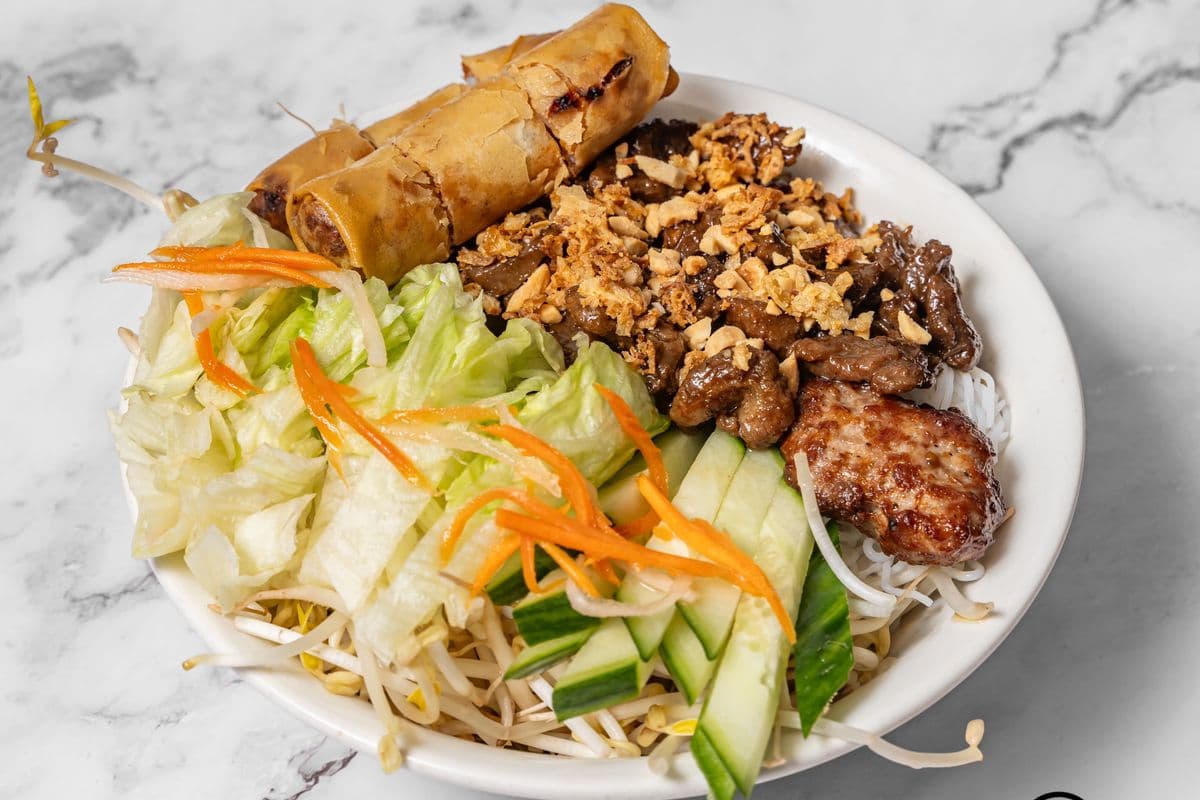 85. Vermicelli Bowl with Grilled Beef and Spring Rolls