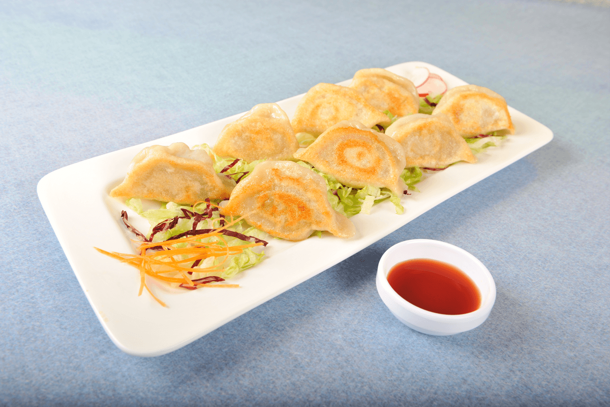 10. Pan-Fried Pork Dumplings (10 pcs)