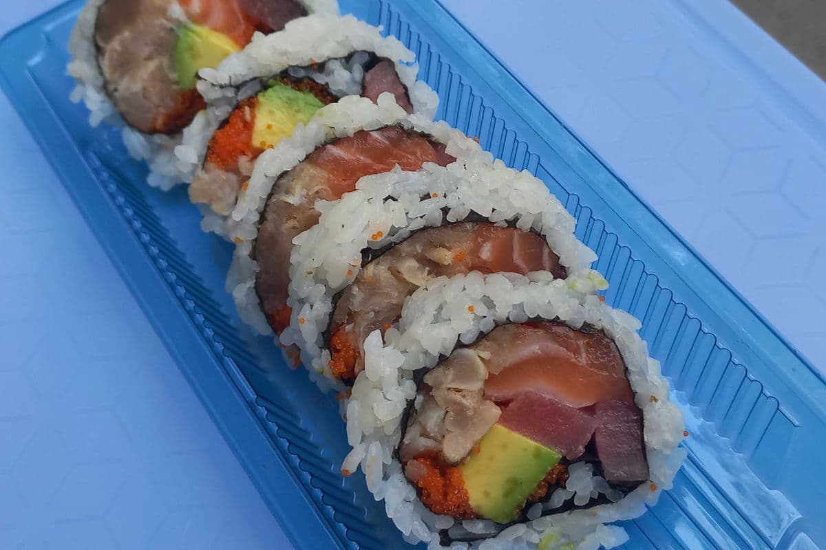 97. Pacific Deluxe Roll(Wasabi mayo, Torched Albacore Tuna, Fresh Tuna, Salmon, Avocado, Fish Roe)