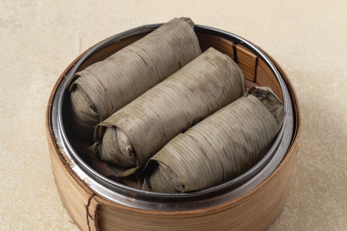 7. Sticky Wild Rice Wraps with Dried Scallop and Pork in Lotus Leaf