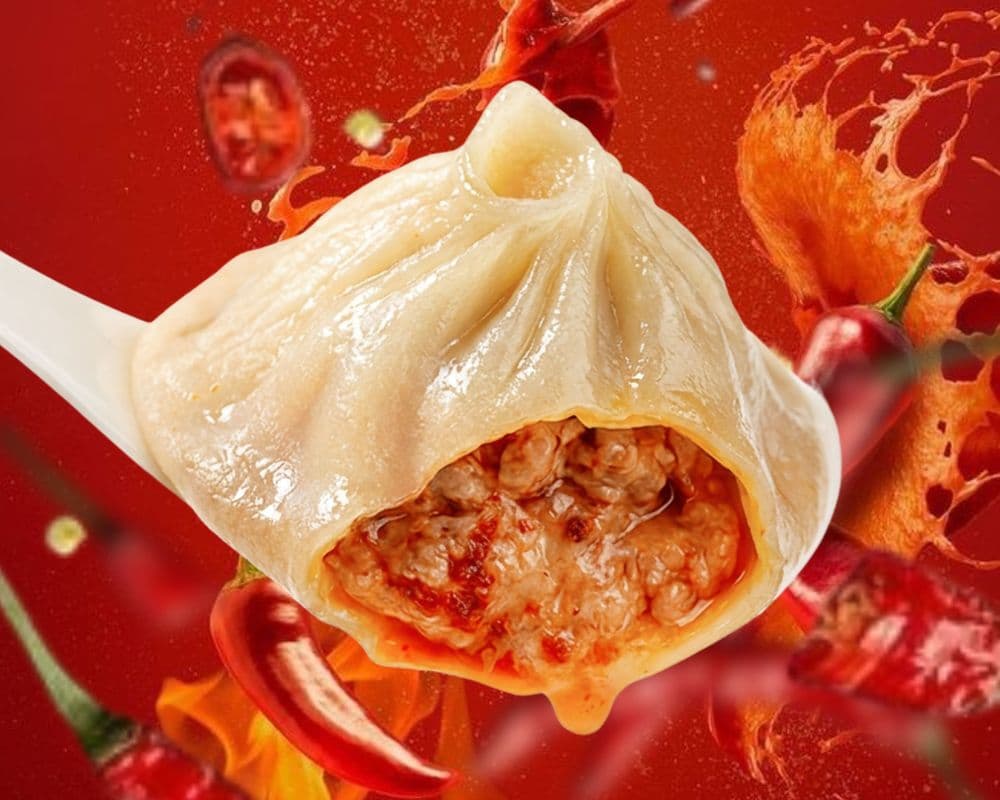 17. Spicy Pork Dumpling / Porc épicé Xiao Long Bao