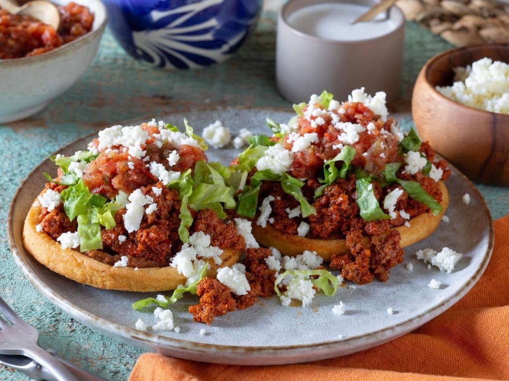 Sopes with chorizo and potato stew