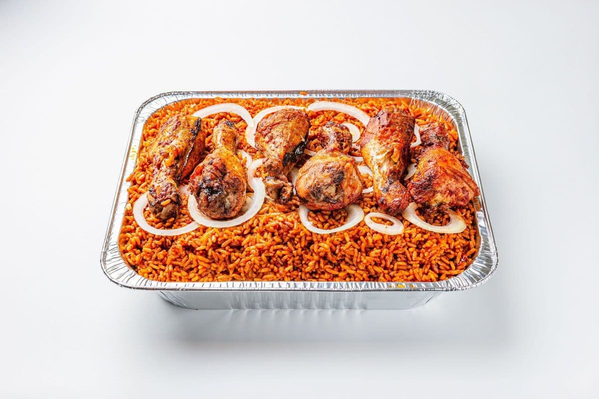 Half Tray Jollof Rice or Six Pieces Chicken