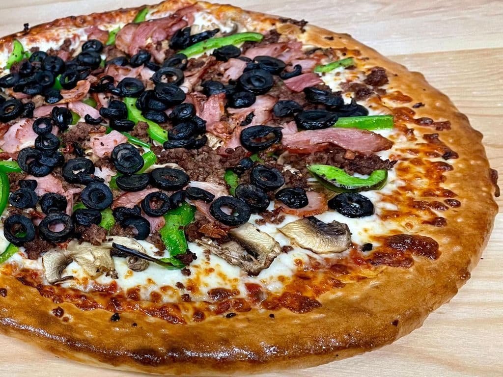 OUR SIGNATURE SPECIALTY PIZZA