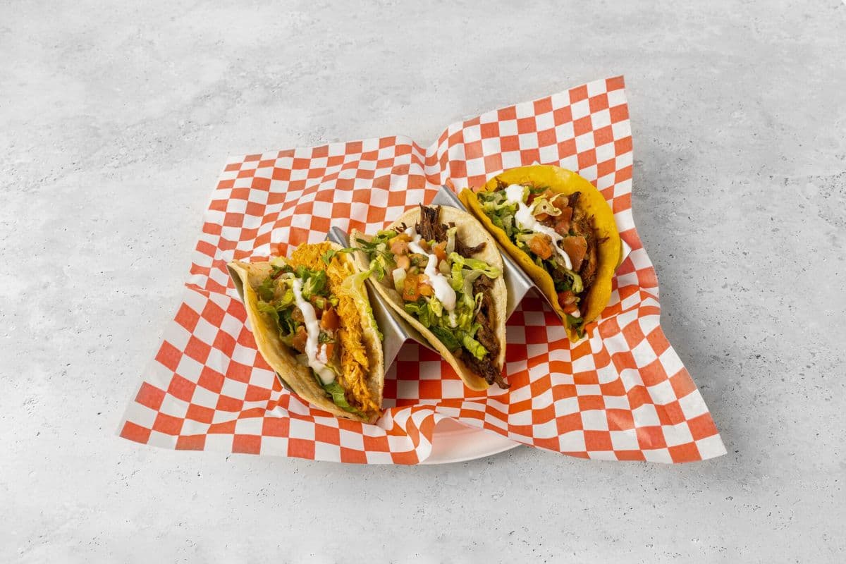 Three Chicken Hard Tacos