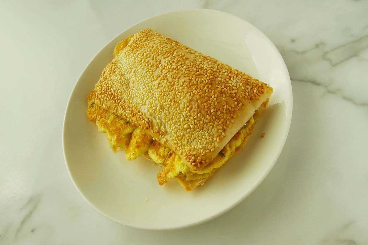 Sesame Seed Cake with Fried Eggs 燒餅夾蛋