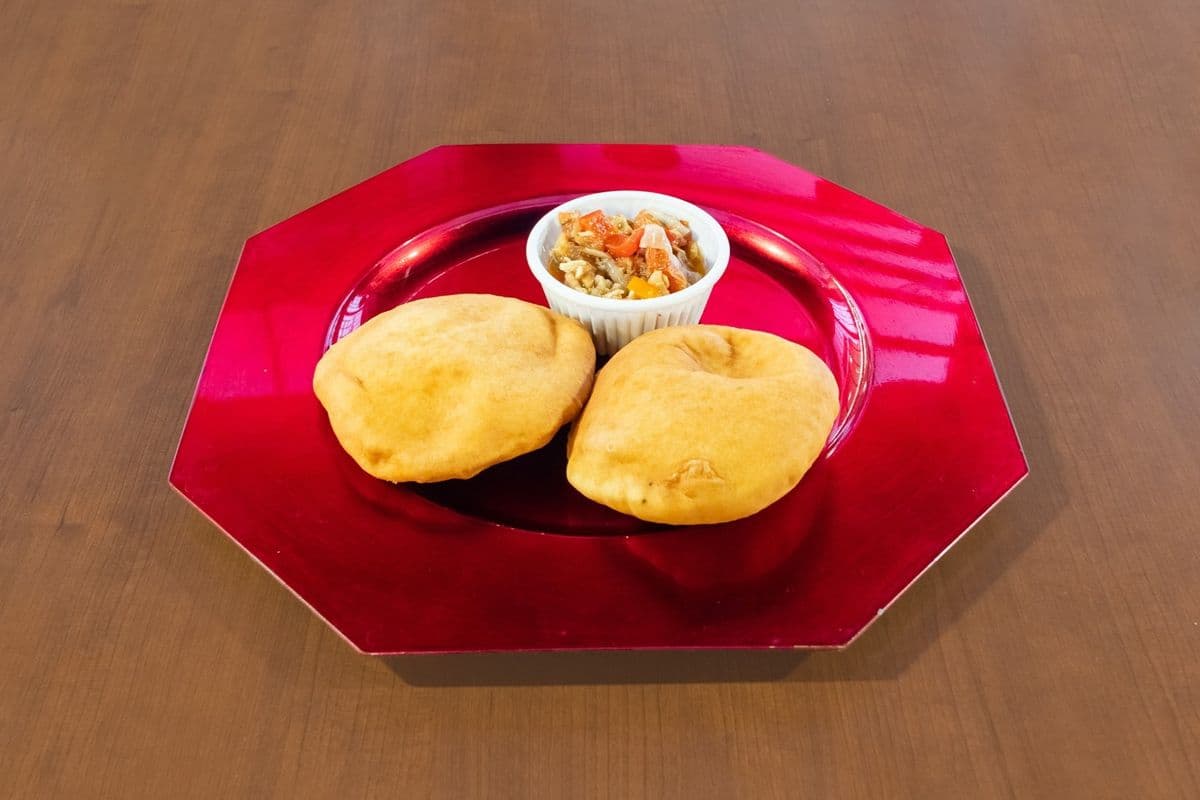 Saltfish with Green Banana or Fry Bake