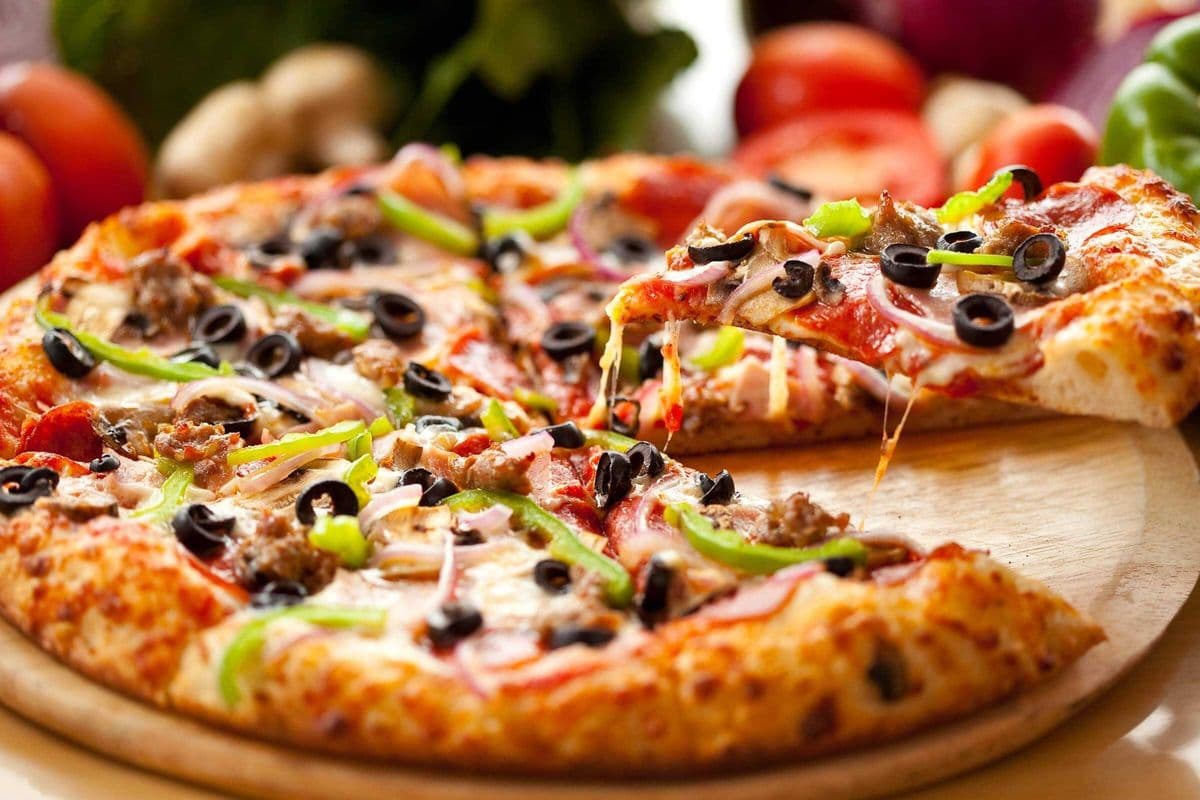 1 medium single topping pizza with 1 dip