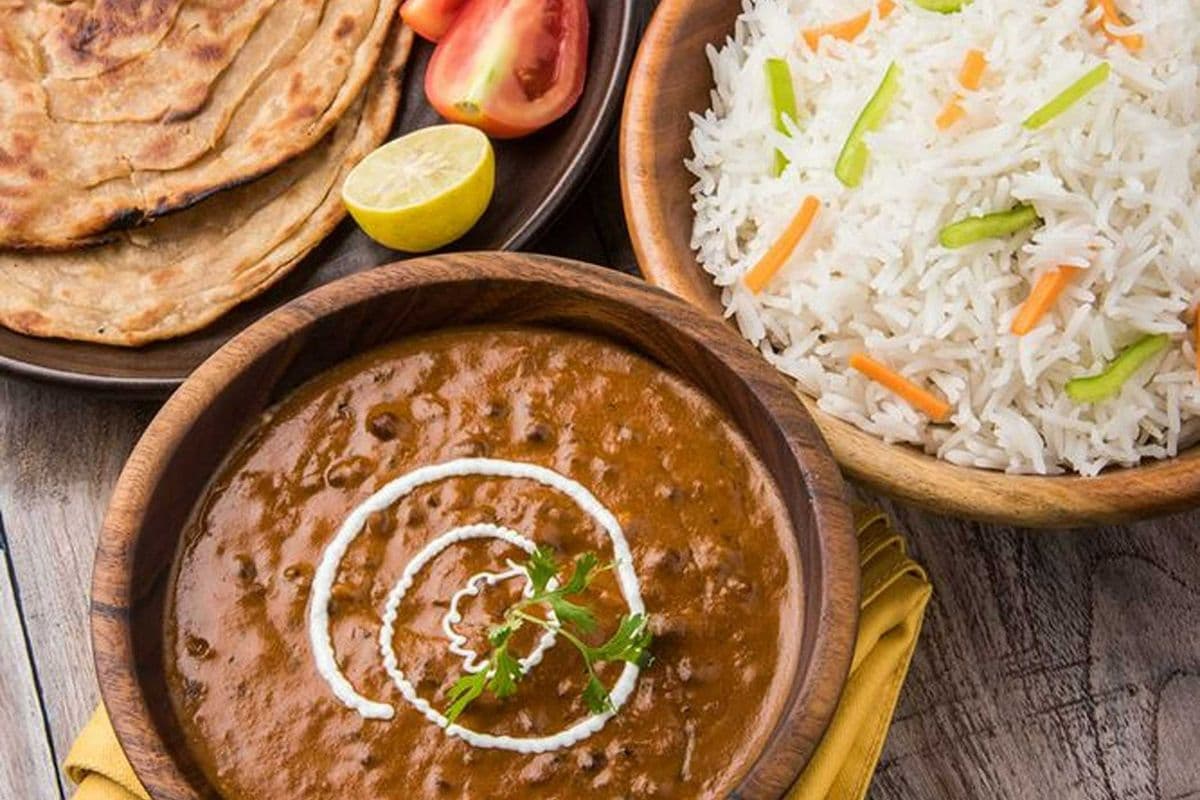 Dal Makhni Free 1 Butter Naan & Half Rice