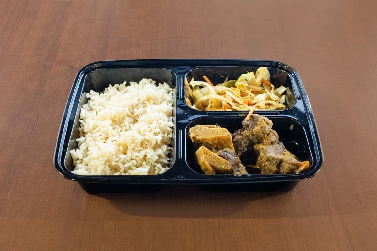Large Curry Goat with Rice and Peas