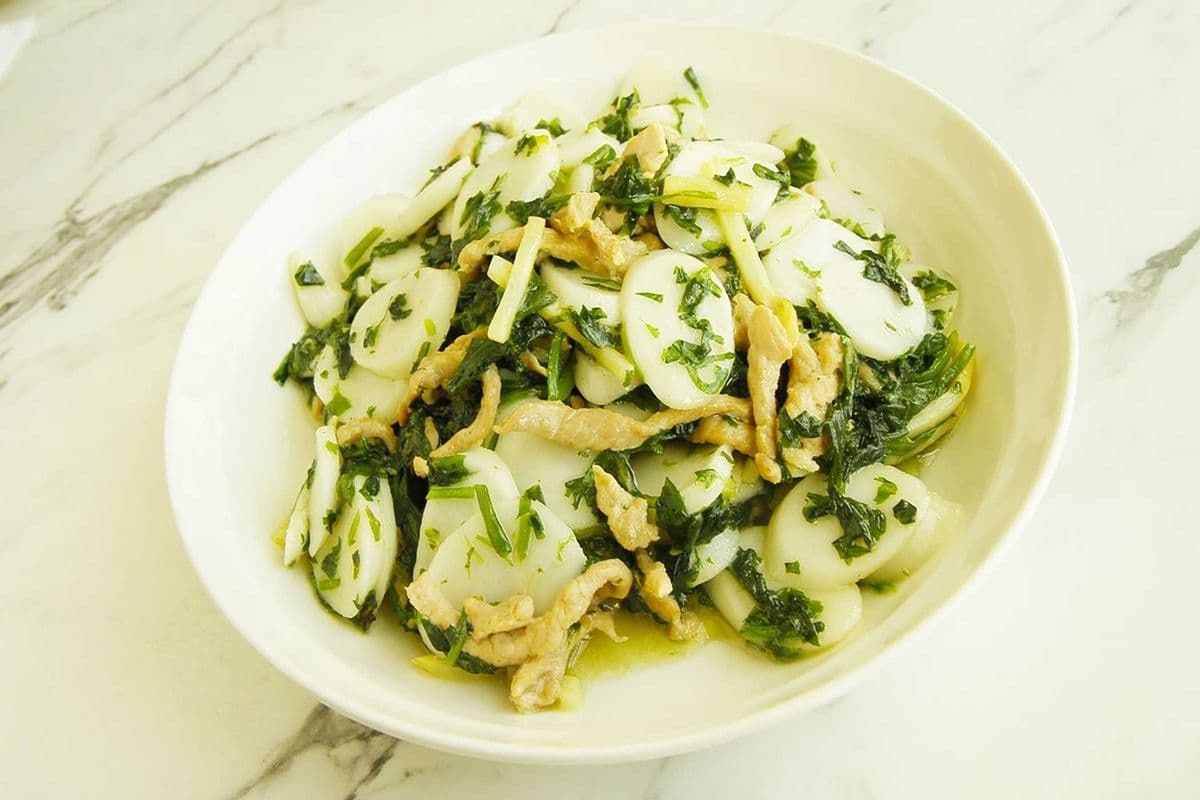 Stir Fried Rice Cake with Chinese Spinach and Pork 薺菜炒年糕(豬)