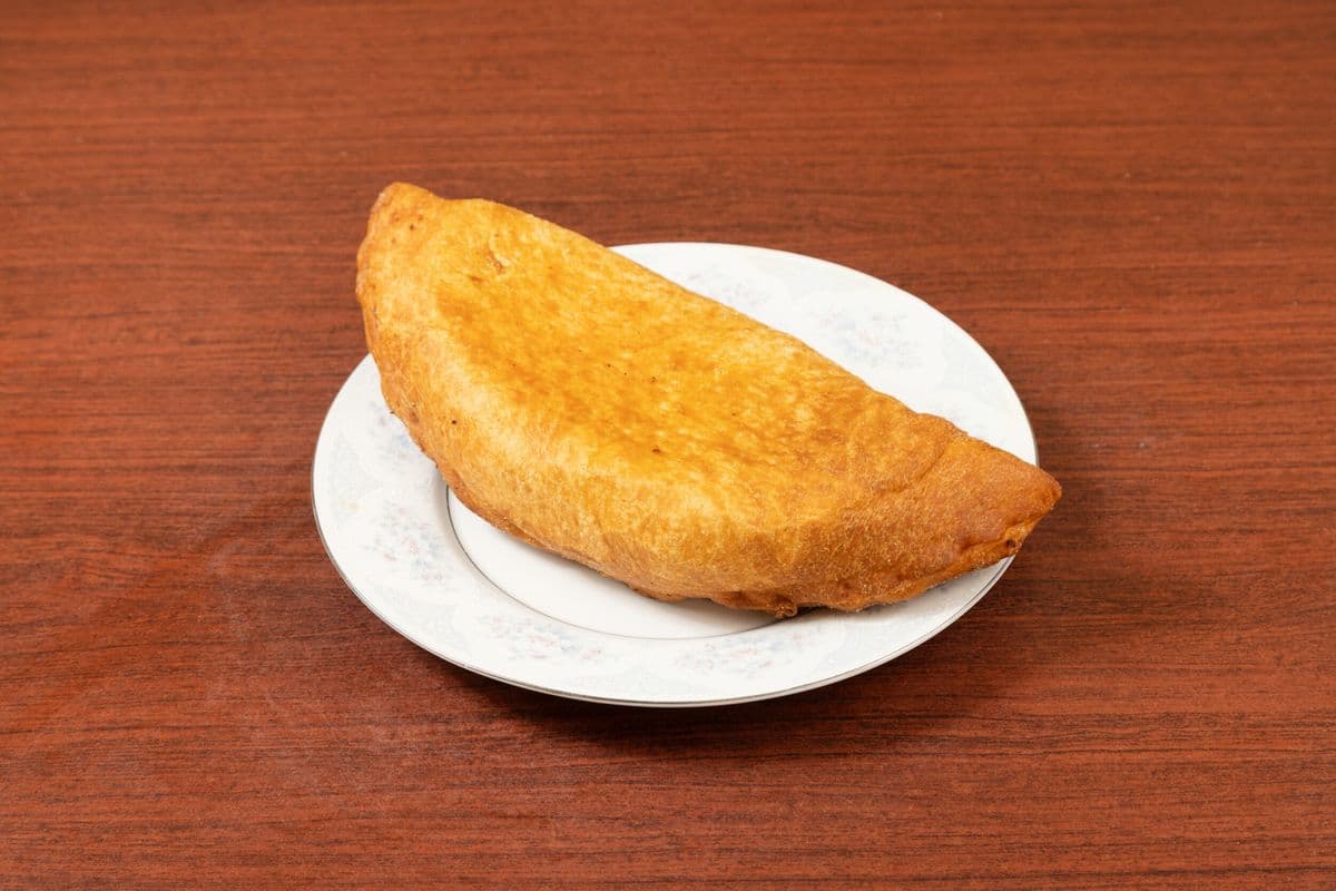Panzo Deal - Two Panzos with Three Toppings Each and Two Pops