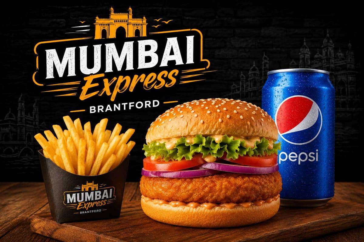 Veg Burger with aloo tikki with fries and a pepsi can