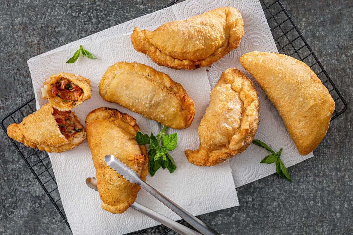 Two panzerotti with 6 toppings combined
