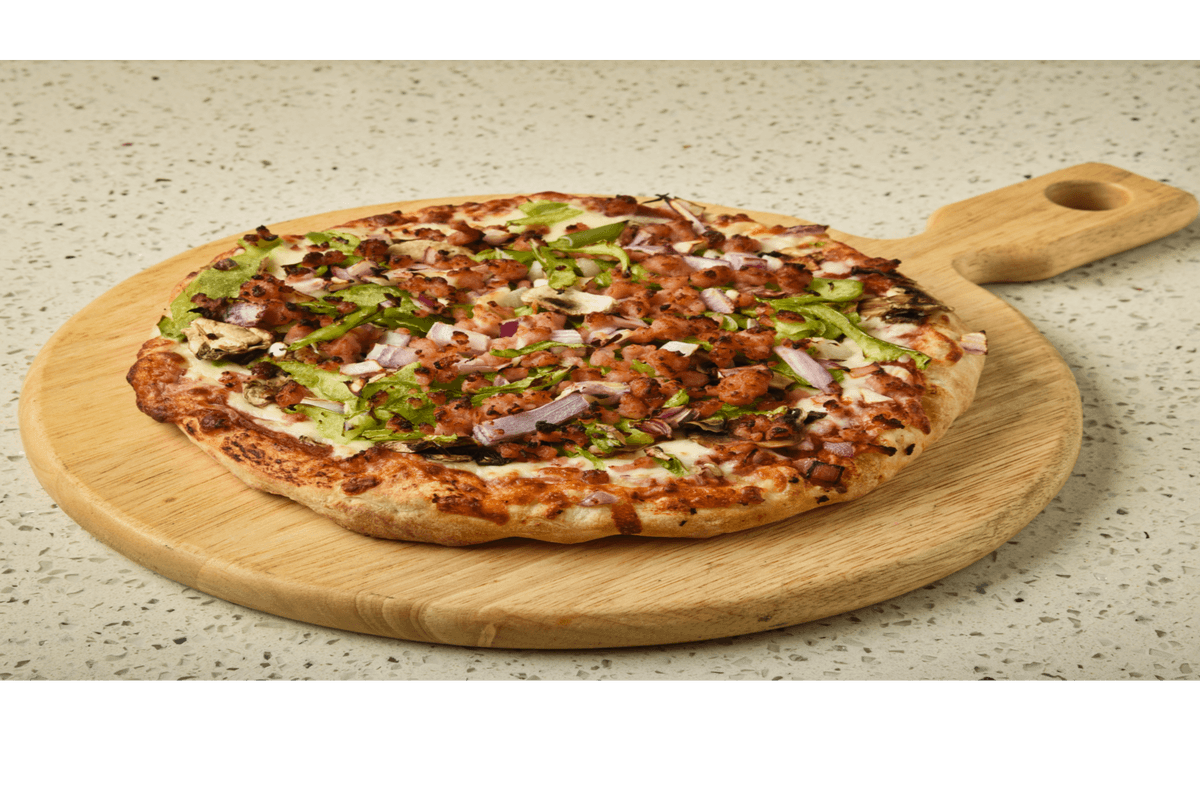 Pizza large toute garnie de Jessy / Large Jessy's Works Pizza