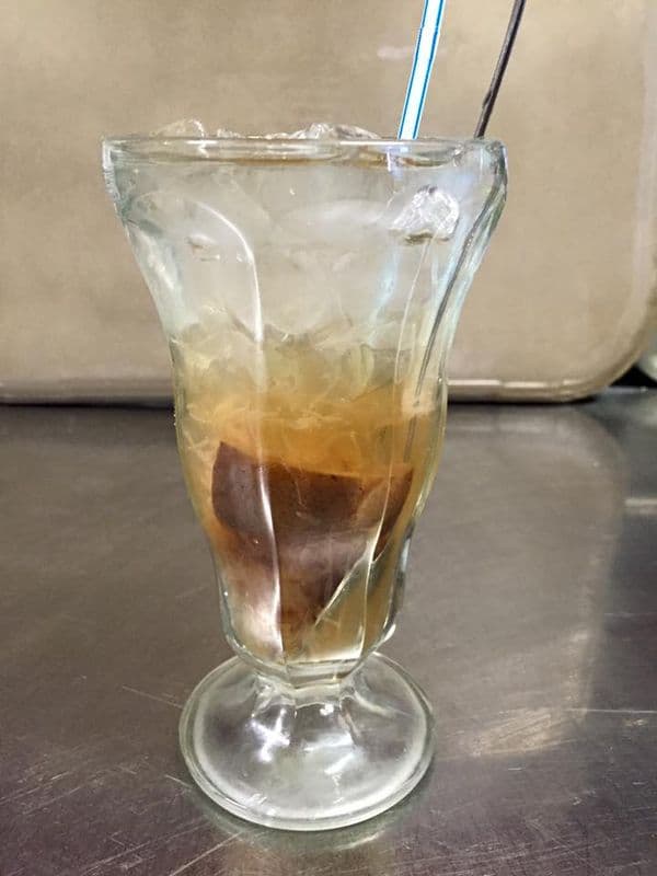 708. Pickle Lemon Mix Club Soda with Ice Cube and Sugar