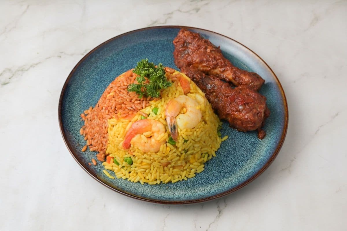 Jollof or Fried Rice with Chicken Legs and Thighs