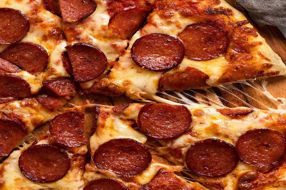 Large four Topper Pizza with 2 Pop