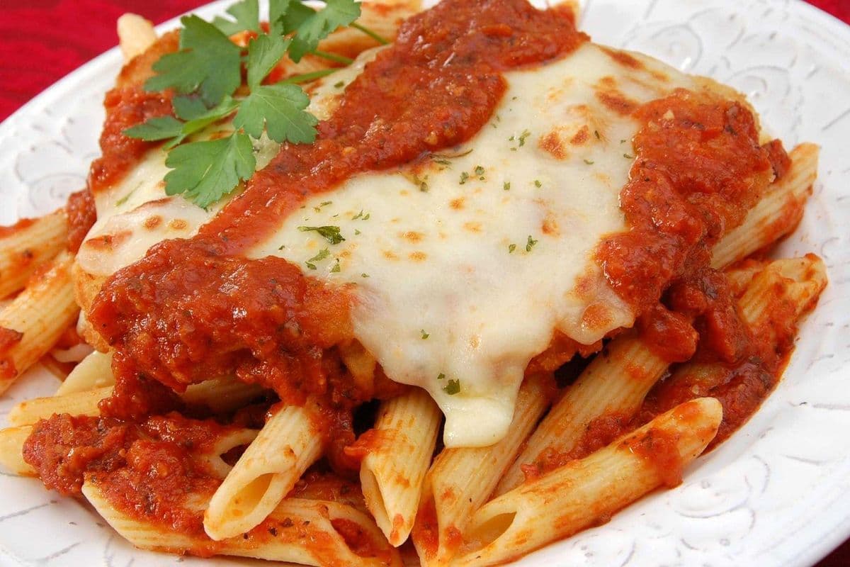 Veal Parmigiana and Penne (side)