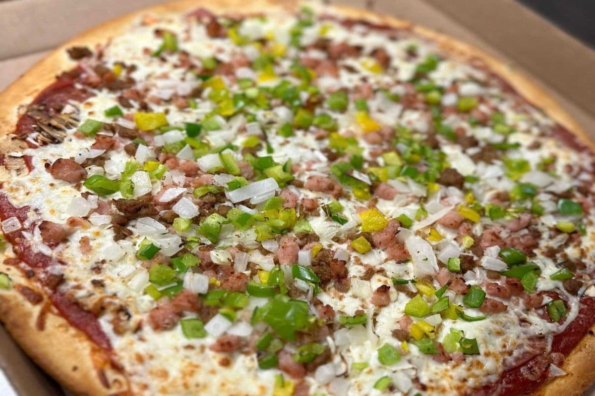 Any Medium Classic Pizza with Garlic Fingers + 2LT Pop