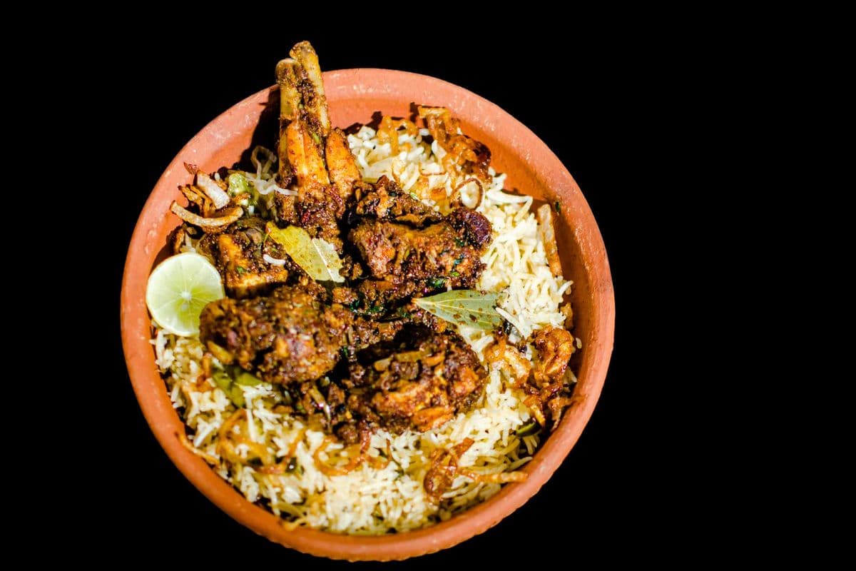 Guntur Chilli Chicken Biryani (Extra Hot) with Pop or Badam Milk (24 oz)