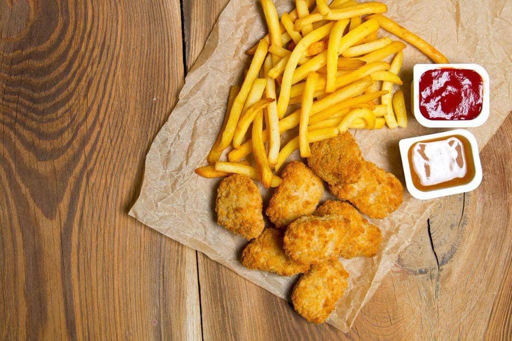 Grilled Chicken Breast Pieces and Fries