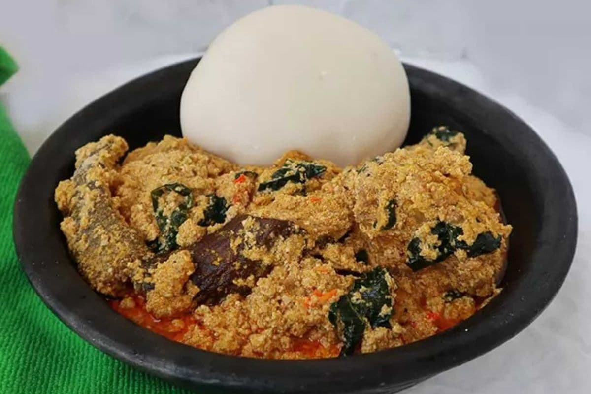 White Garri (Eba) with Egusi and Assorted Meat