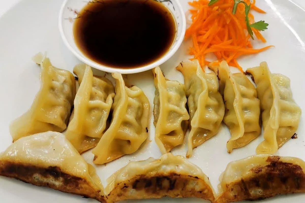 # 6 Dumplings au Poulet ou bœuf / Dumplings Chicken or Beef
