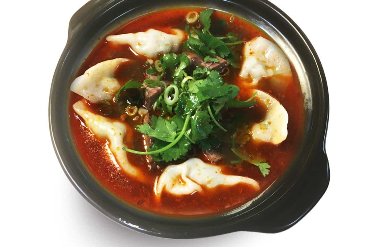 Spicy beef soup with dumplings麻辣牛肉湯餃