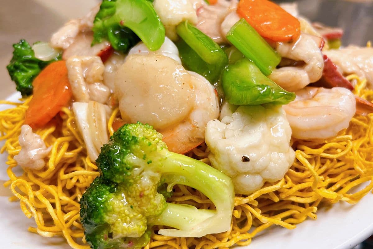 Shrimp and Mixed Greens On Fried Noodles