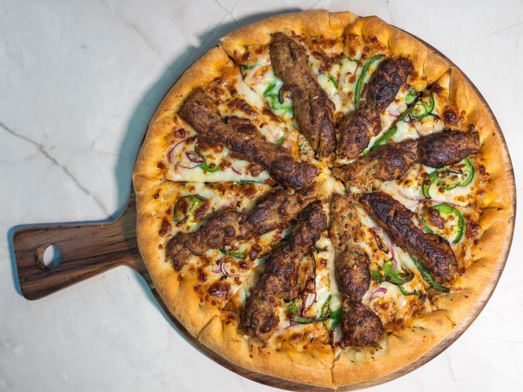 Chicken Reshmi Kabab Pizza