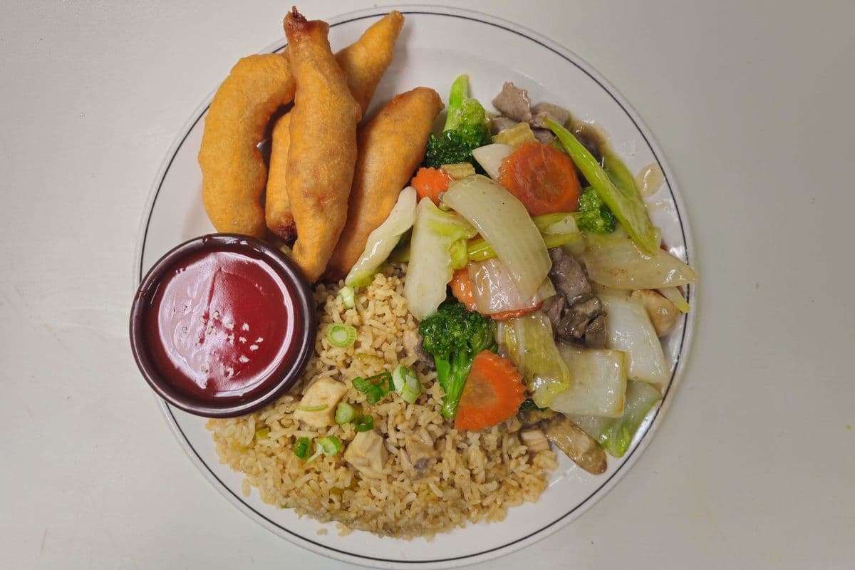10. Chicken Fried Rice, Sweet-and-Sour Shrimp (4 pieces) and Beef Mixed Greens