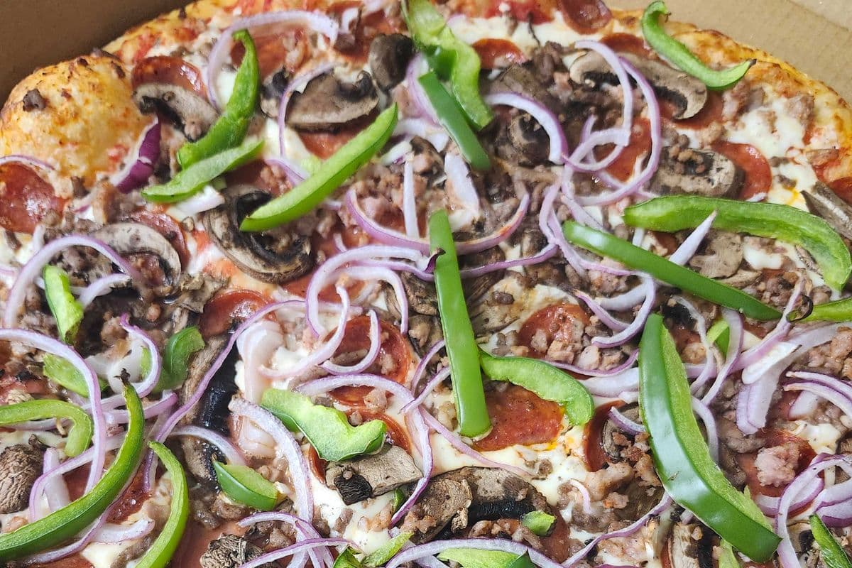 18. 12" Medium Supreme Pizza