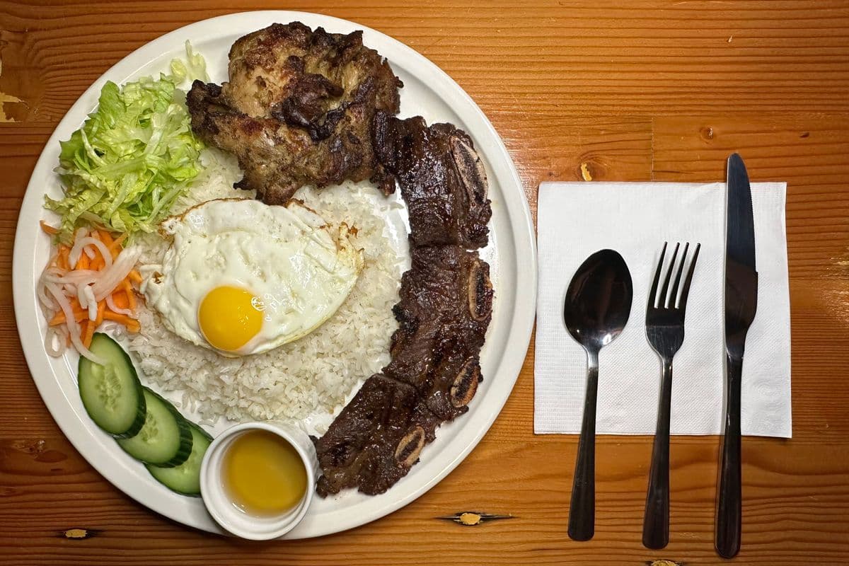 29. Charbroiled Beef Short Ribs and Boneless Chicken Topping with a Fried Egg