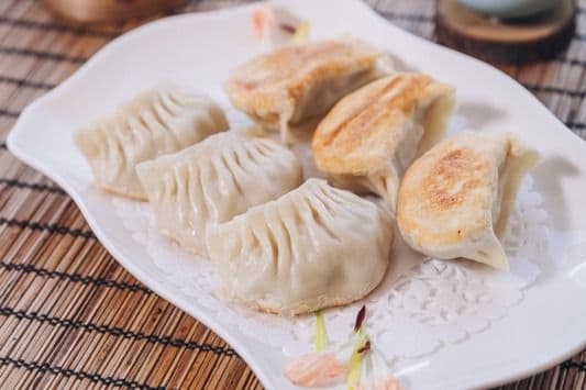 119. Pan-Fried Dumpling with Ground Pork and Celery (10 pcs) - 特色煎饺