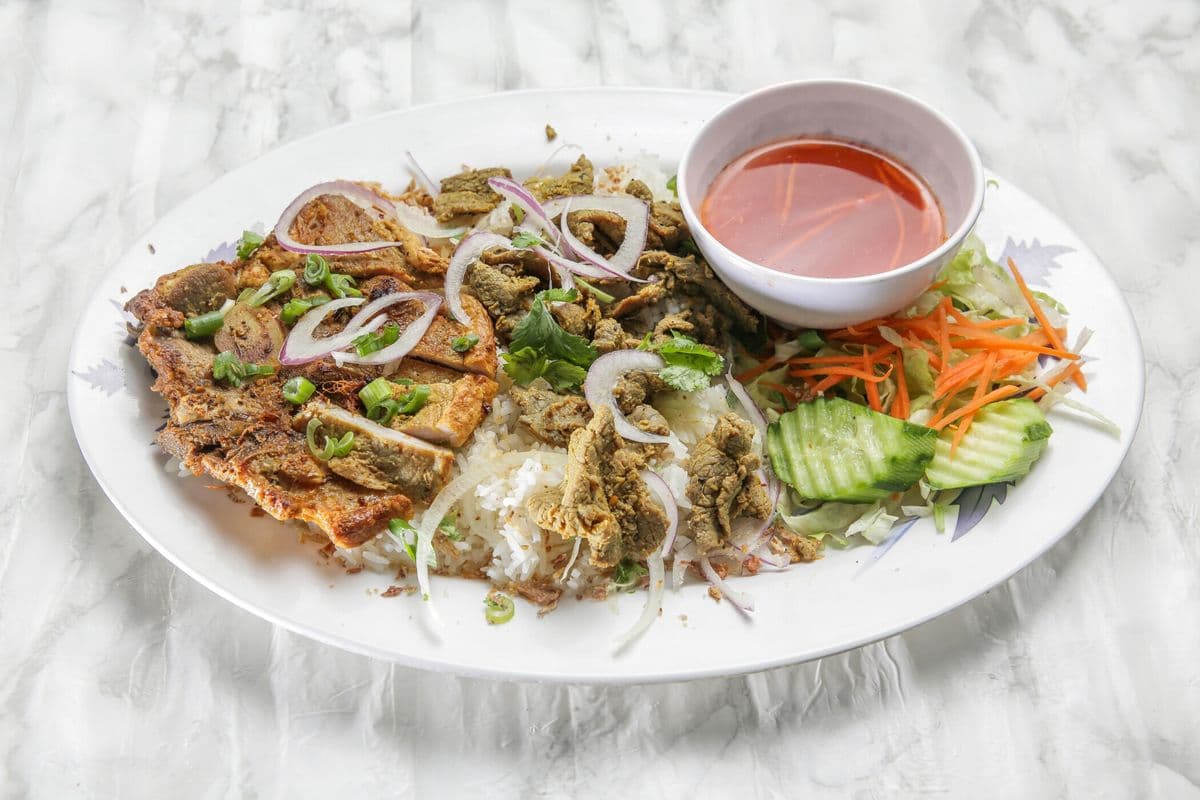 65. Pork Chop and Grilled Beef and Steamed Rice (Com Suon Và Bò Nuong Xa)