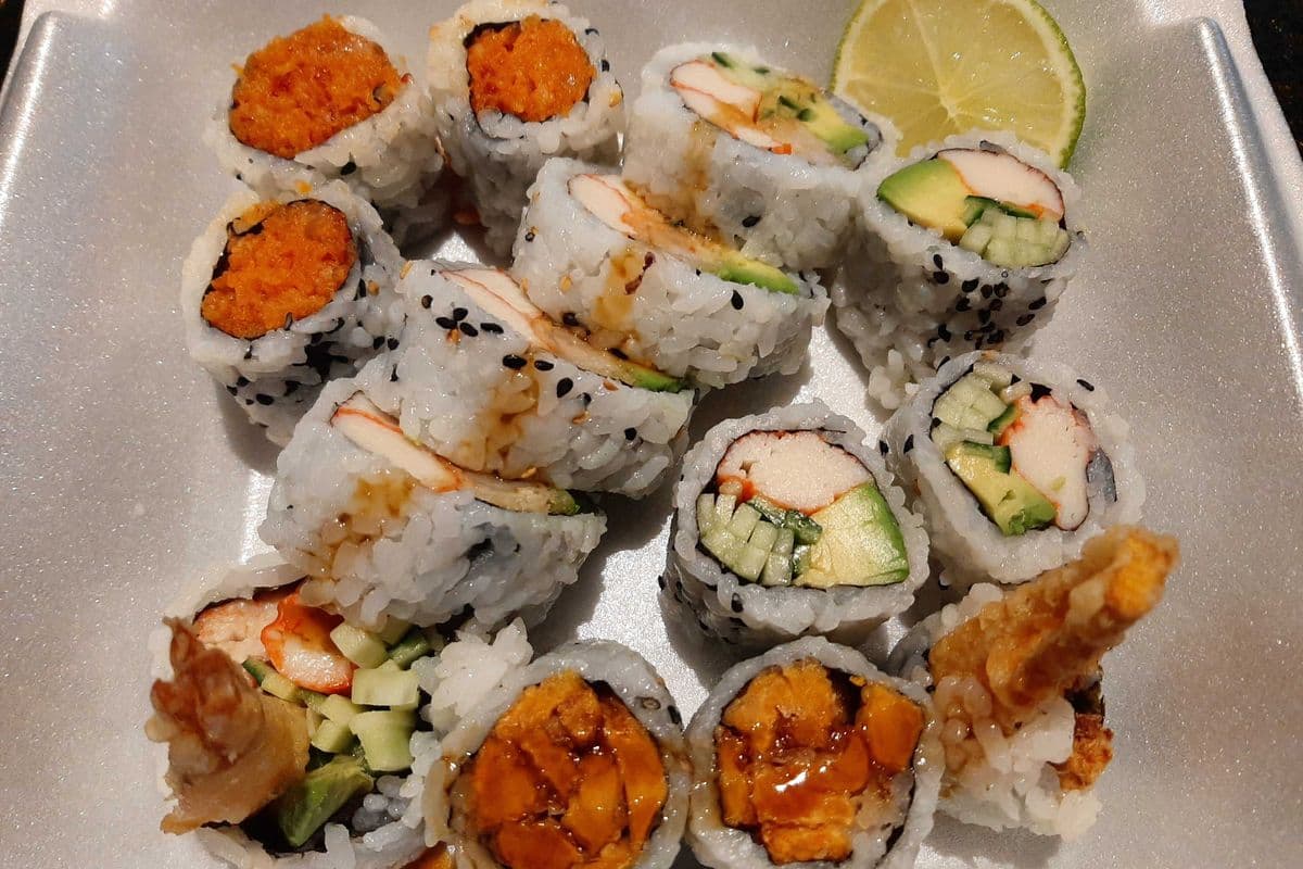 MD1 California (3 pcs), Dynamite (5 pcs), Spicy Salmon (3 pcs), and Yam Tempura (3 pcs)