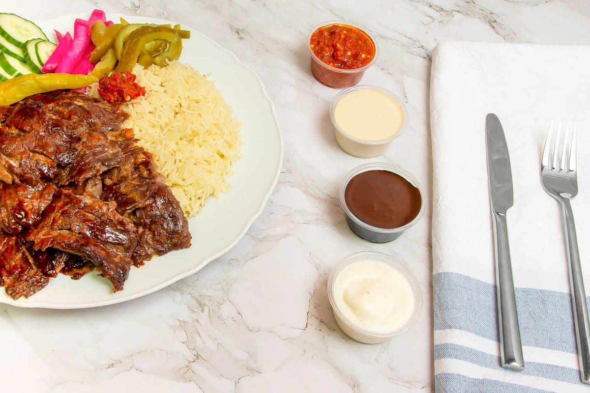 Veal shawarma on rice or fries