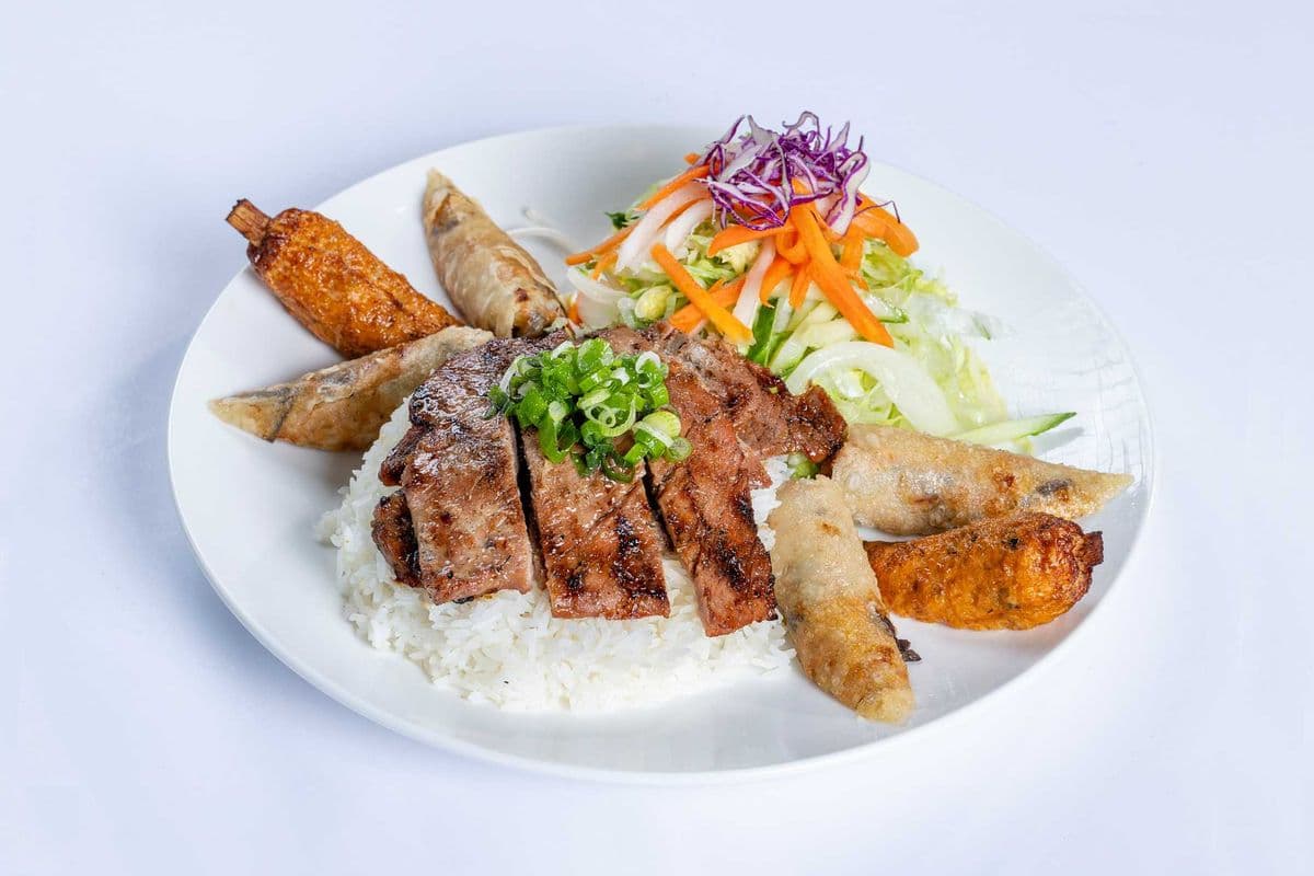 32. Lemongrass Chicken or Pork, Spring Rolls, and Minced Shrimp on Sugarcane / (Ga hoac heo uop xa, cha gio va chao tom)