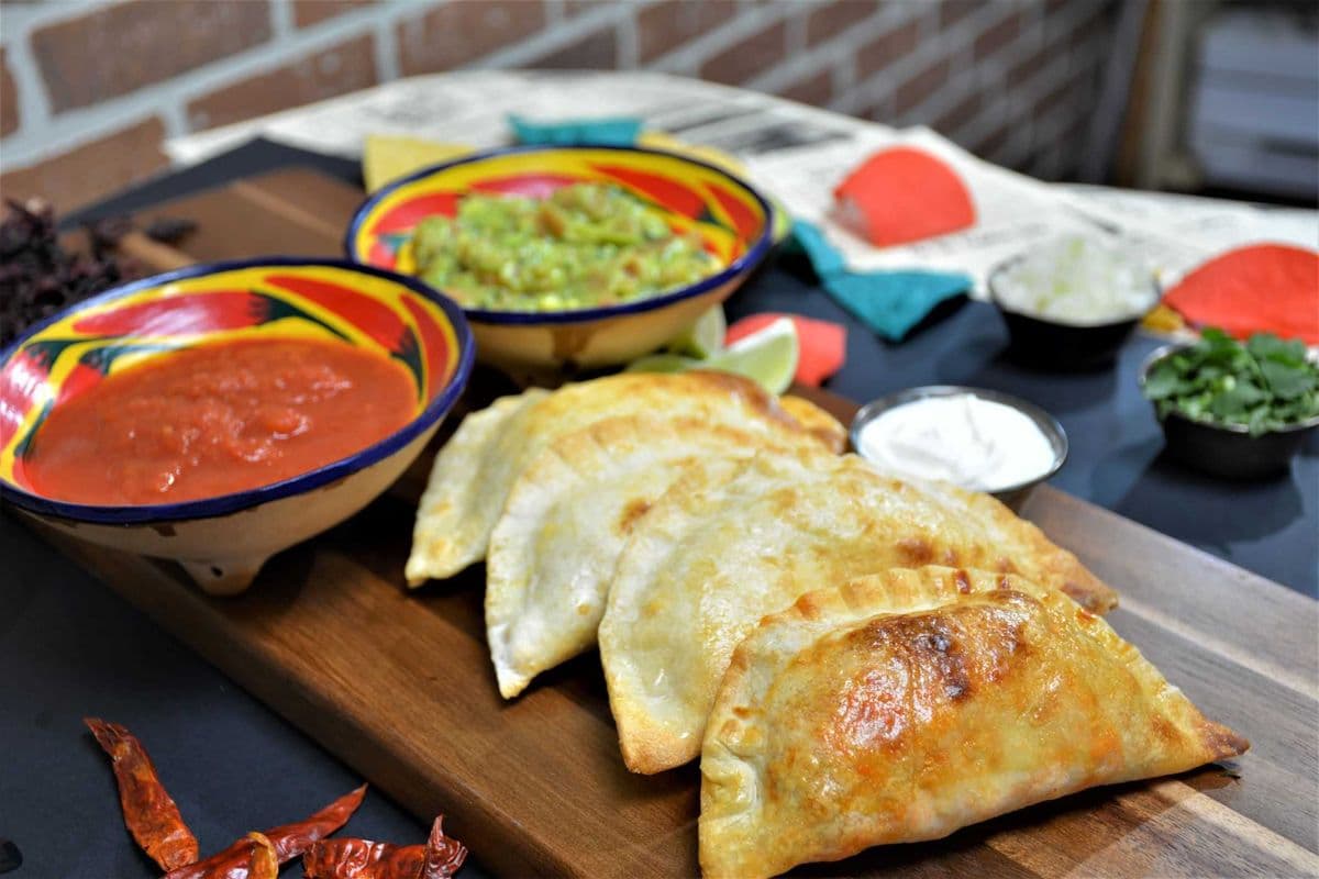 Fiesta Empanadas (10 pcs) with Salsa, Guaca, and Cream