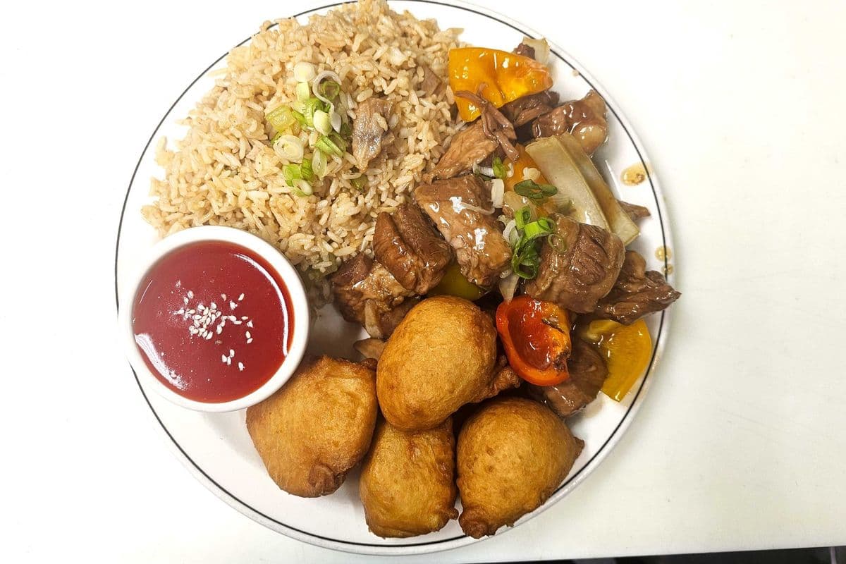 12. Chicken Fried Rice, Garlic Spareribs, and Sweet-and-Sour Chicken Balls (4 pieces).