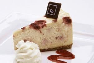 Raspberry White Chocolate Cheesecake (By the Slice)