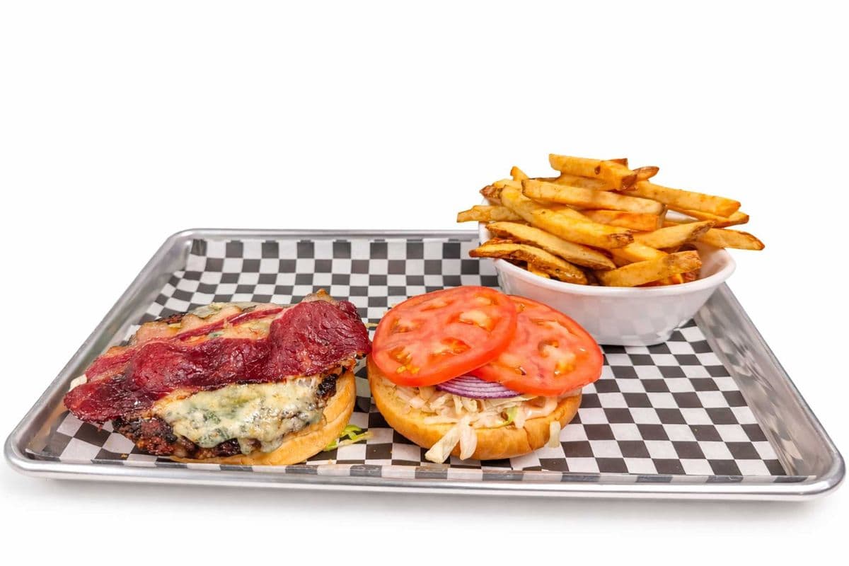 Blue cheese Bacon Burger with fries.