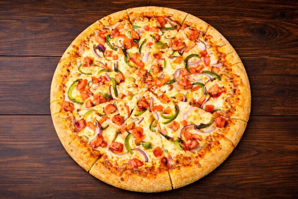 9. Chicken or Paneer Tandoori Pizza -8" Mini